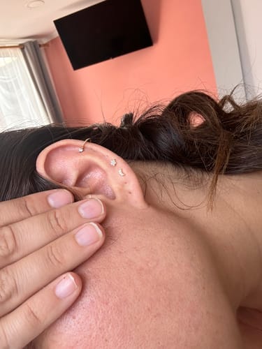 Customer photo review of PIERCING SHINE BAÑO DE ORO