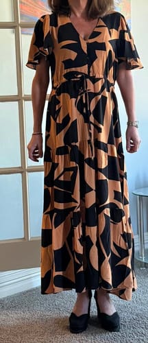 Customer photo review of Santorini  Short Sleeve Midi Dress in Orange and Black Print