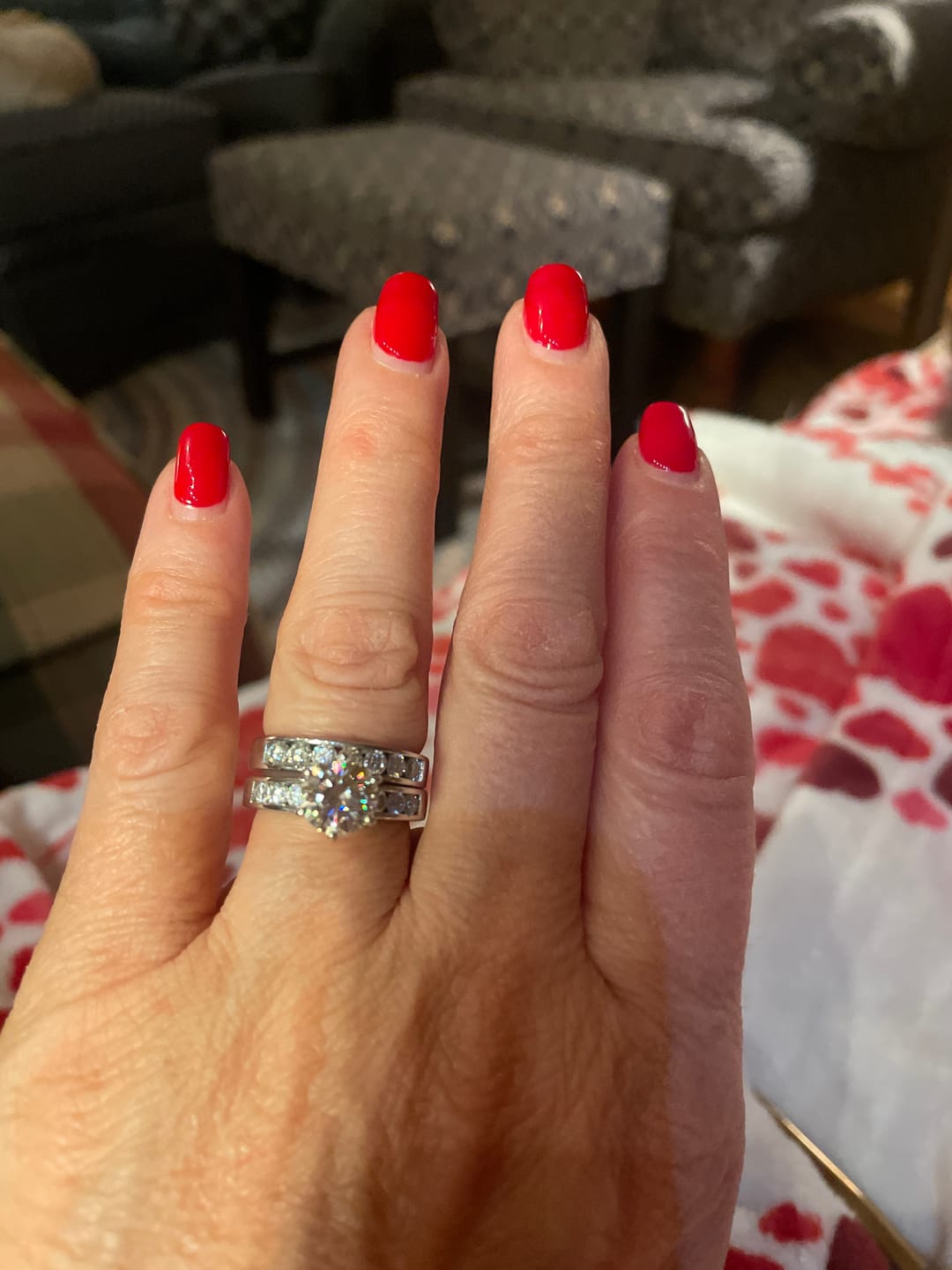 Customer photo review of Channel Set Moissanite Half Eternity Wedding Band Ring In Sterling Silver