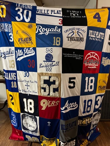 T-shirt quilt featuring sacred heart trojans, ville platte royals by Karen from LA