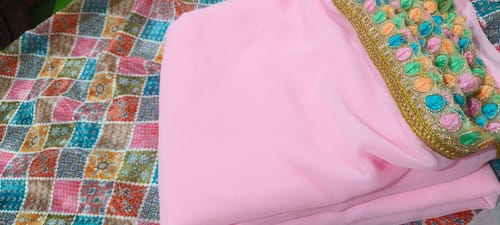Customer photo review of Pink Solid Georgette Saree With Sequins Embroidered Border