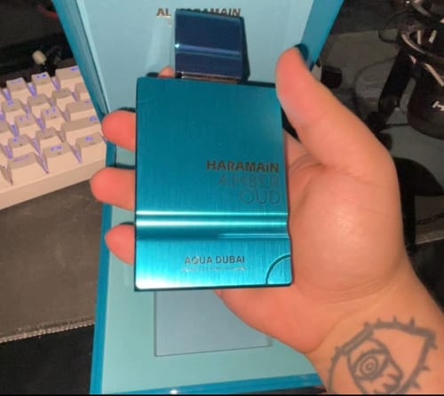 Reseña con foto de un cliente sobre Perfume Al Haramain Amber Oud Aqua Dubai XDP Unisex