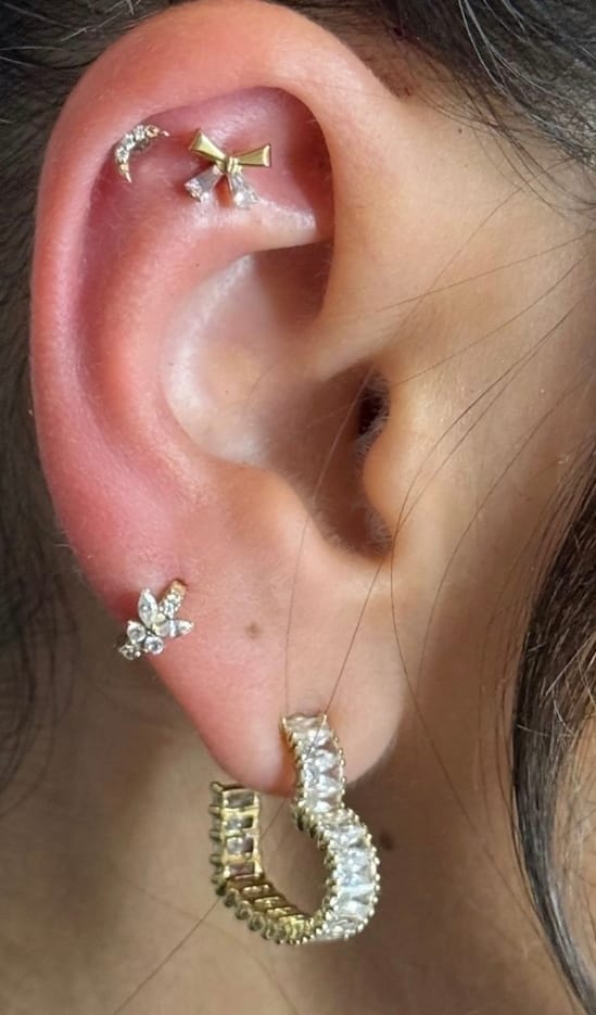 Customer photo review of Bow Tie Piercing | Titan