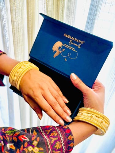 Customer photo review of "Ancient Gold Elegance: Cream Bangle Beauty "