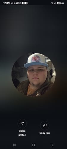 Customer photo review of Lazy J Ranch White & Baby Blue Arrowhead Classic Five Panel Trucker Hat