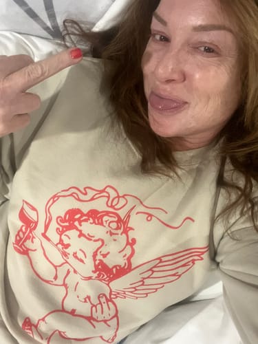 Customer photo review of Cupid Don't Care Sweatshirt