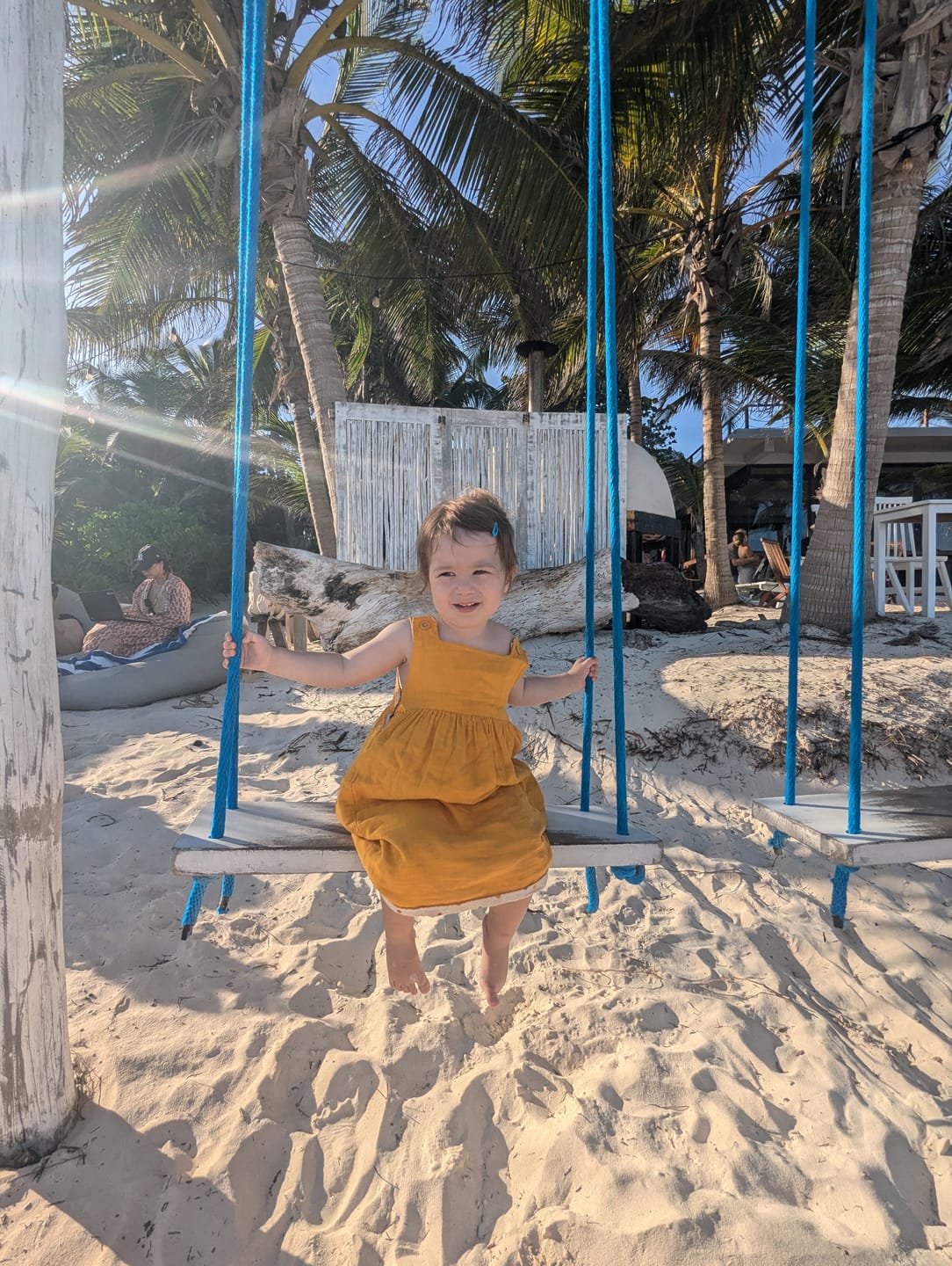 Customer photo review of Rainbow Spots Reversible Pinny Dress