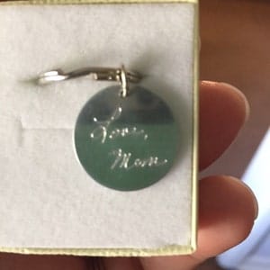 Customer photo review of Actual Baby's Footprint or Handprint Keychain, Mother's Day Gift, Father's Day Gift for Dad, Custom Engraved Photo Keychain, Stainless Steel Keychain