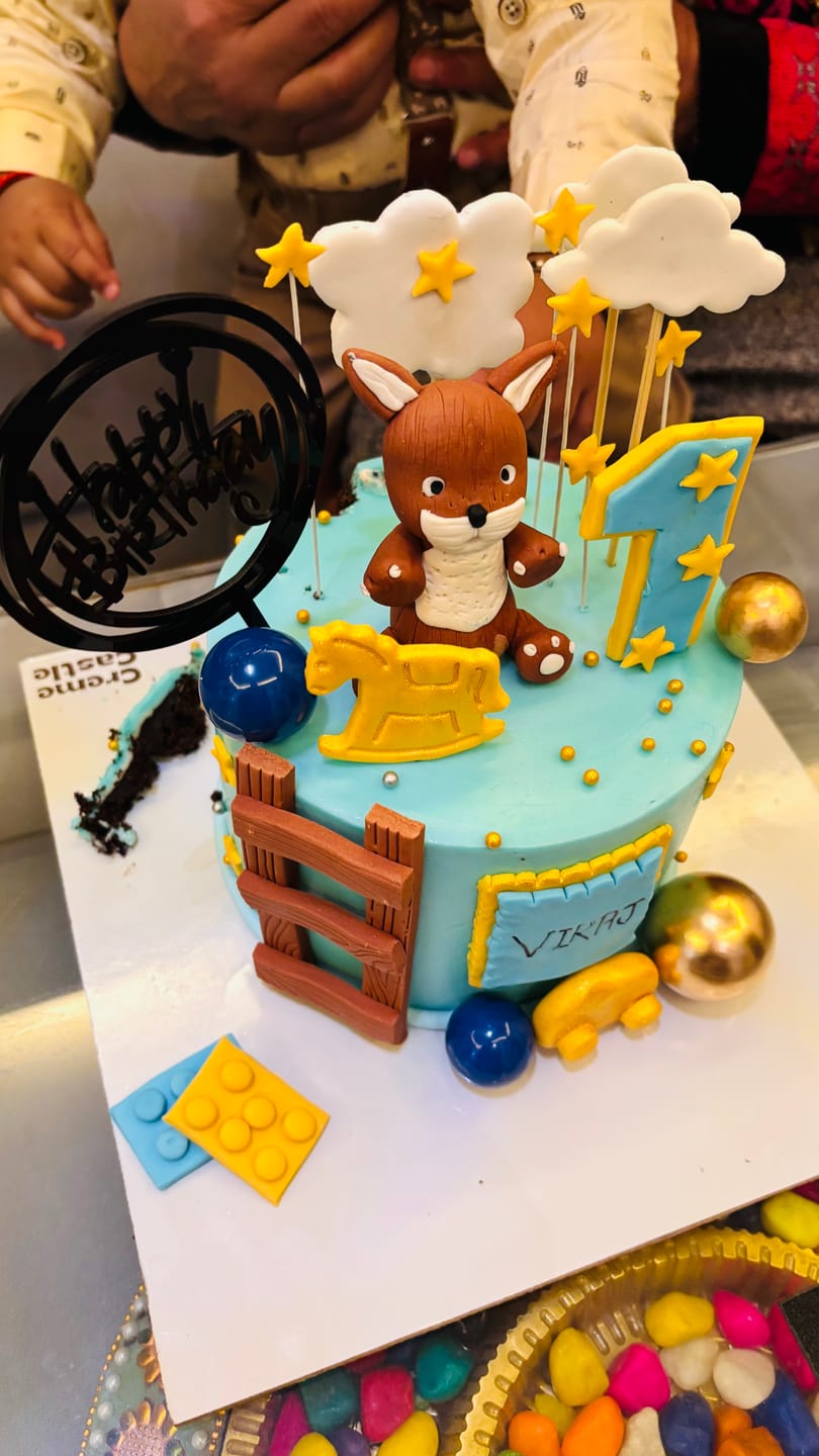 Customer photo review of Teddy and ladder Cake