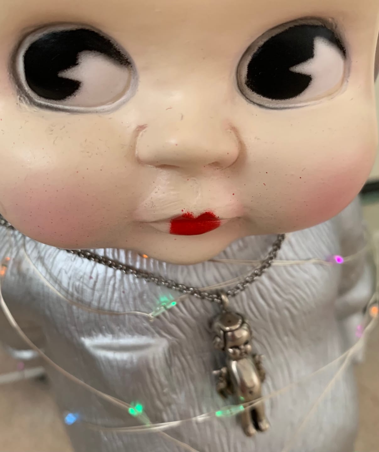 Customer photo review of Baby with Lobster Arms Necklace