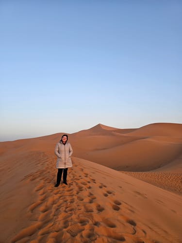 Customer photo review of Latte Duck Down Midi Puffer Coat