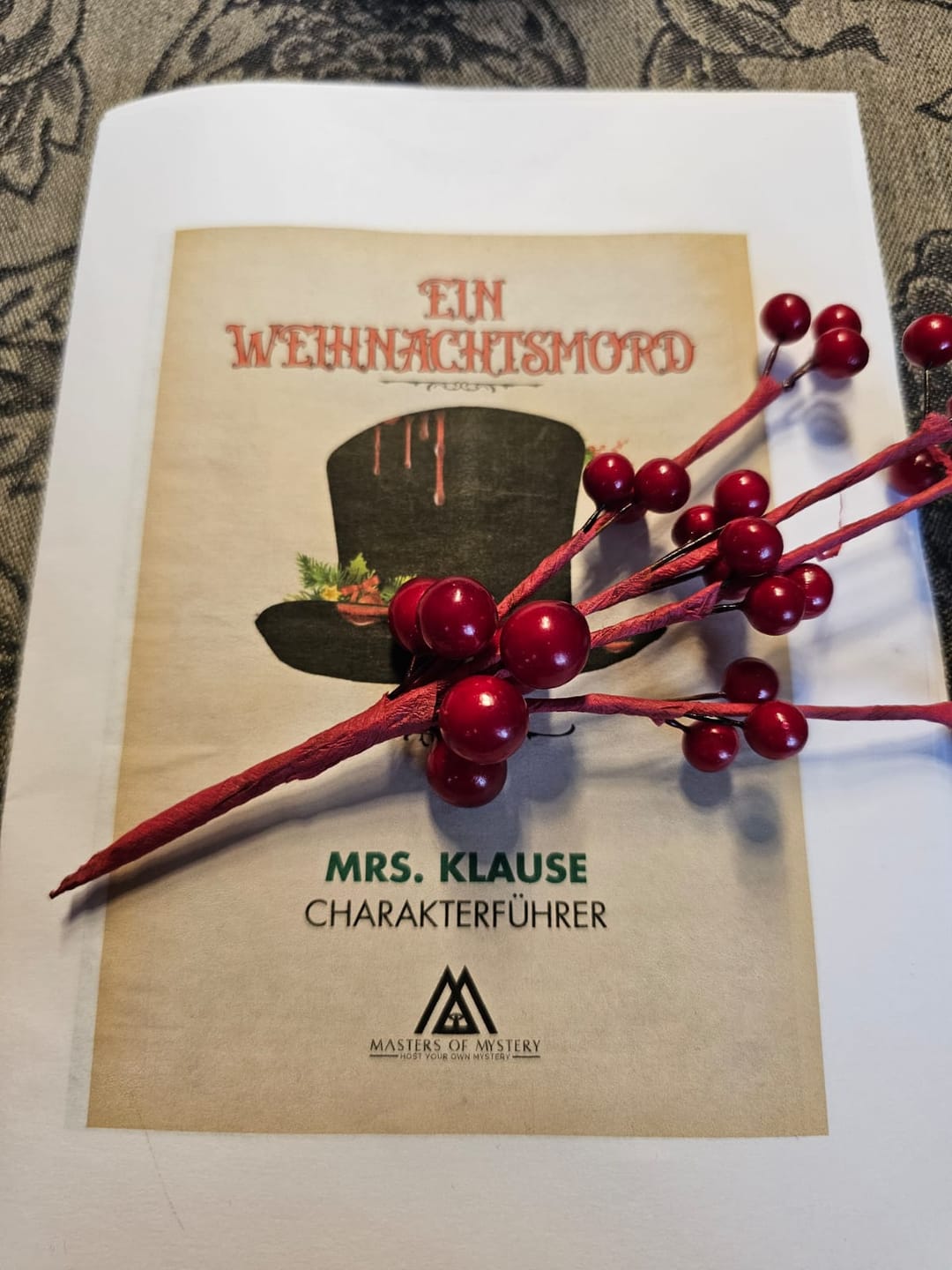 Customer photo review of Christmas Murder Mystery Host Your Own Dinner Party Game Kit
