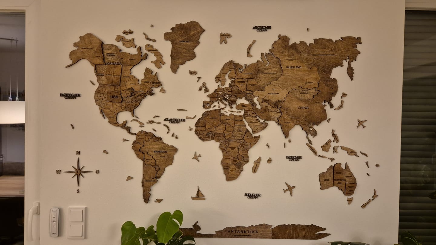 Customer photo review of 3D Wooden World Map Dark Walnut