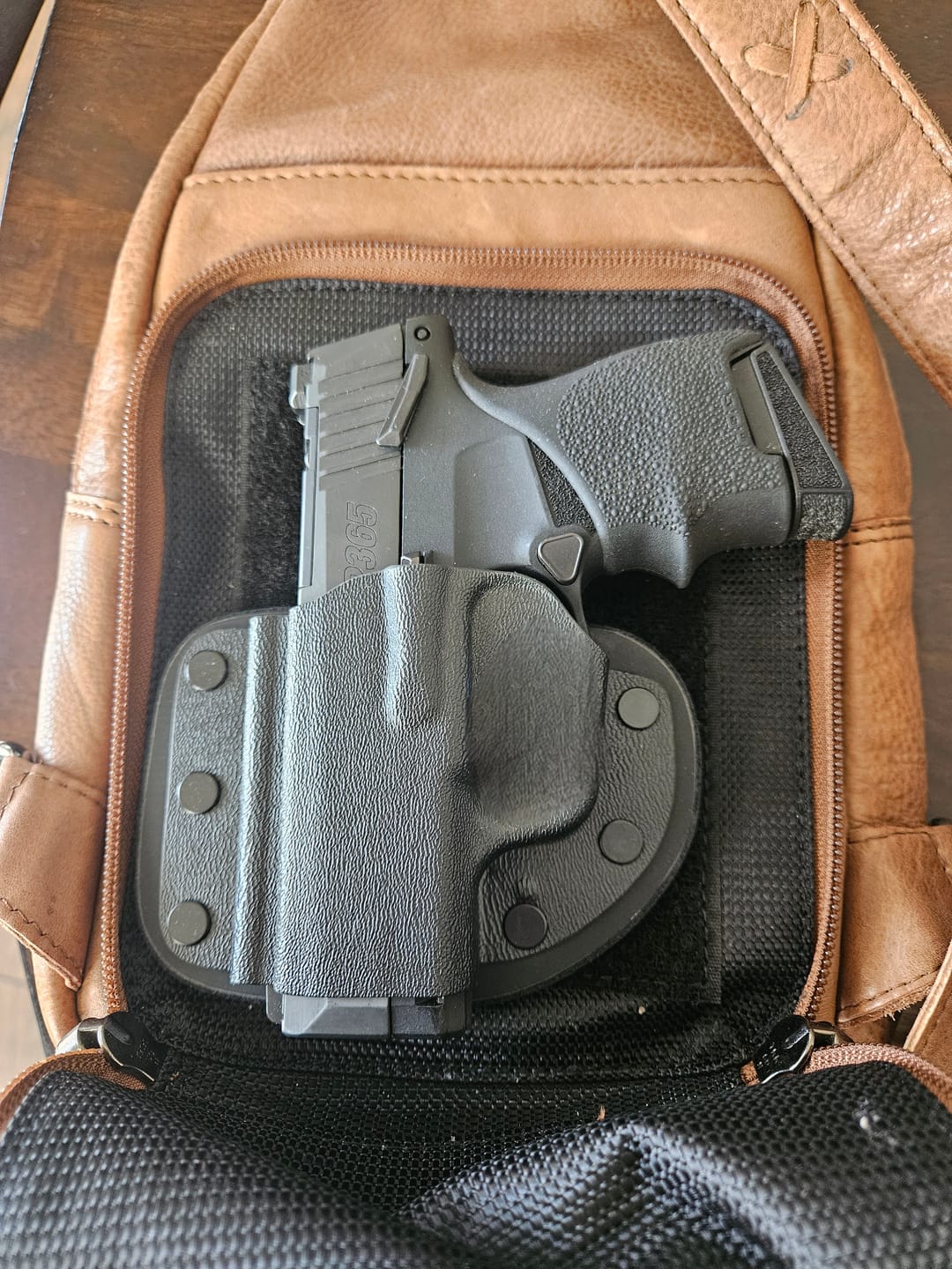 Customer photo review of Taylor Leather Sling Backpack