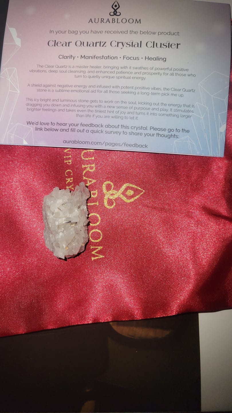 Customer photo review of White Angel Aura Quartz Crystal