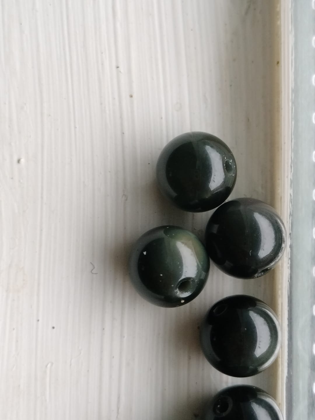 Customer photo review of 15.5" 6mm/8mm/10mm/12mm Natural rainbow(Black) obsidian round beads