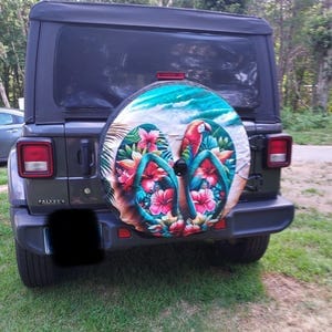 Customer photo review of Beach Flip Flops Sun Spare Tire Cover, Ocean Backup Camera Hole Rear Wheel Car Accessories Palm Tree Unique Design Back Aesthetic Men Women
