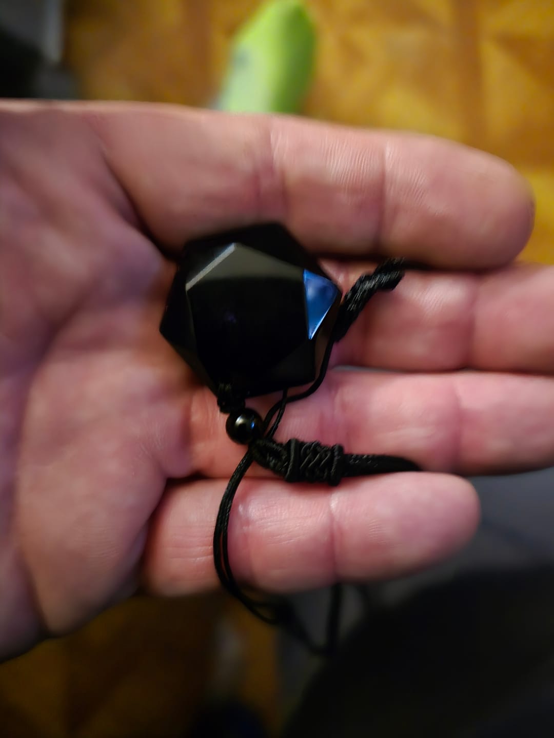 Customer photo review of Obsidian Self Protection Necklace