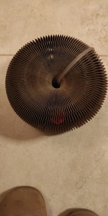 Customer photo review of Magic Cat Scratch Organ Board Cat Toy with Ball Cat Grinding Claw Cat Climbing Frame Kitten Round Corrugated Cat Scratching Toy