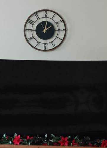 Customer photo review of METAL WALL CLOCK with Wooden Corners