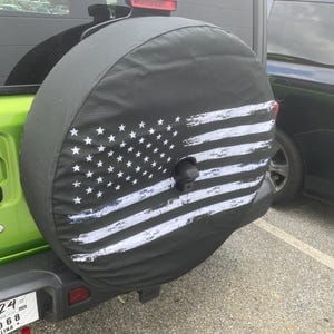 Customer photo review of American Flag Spare Tire Cover, USA Patriotic Distressed Backup Camera Hole Wheel Unique RV Back Cars RV Men Women Girls Trailer Campers