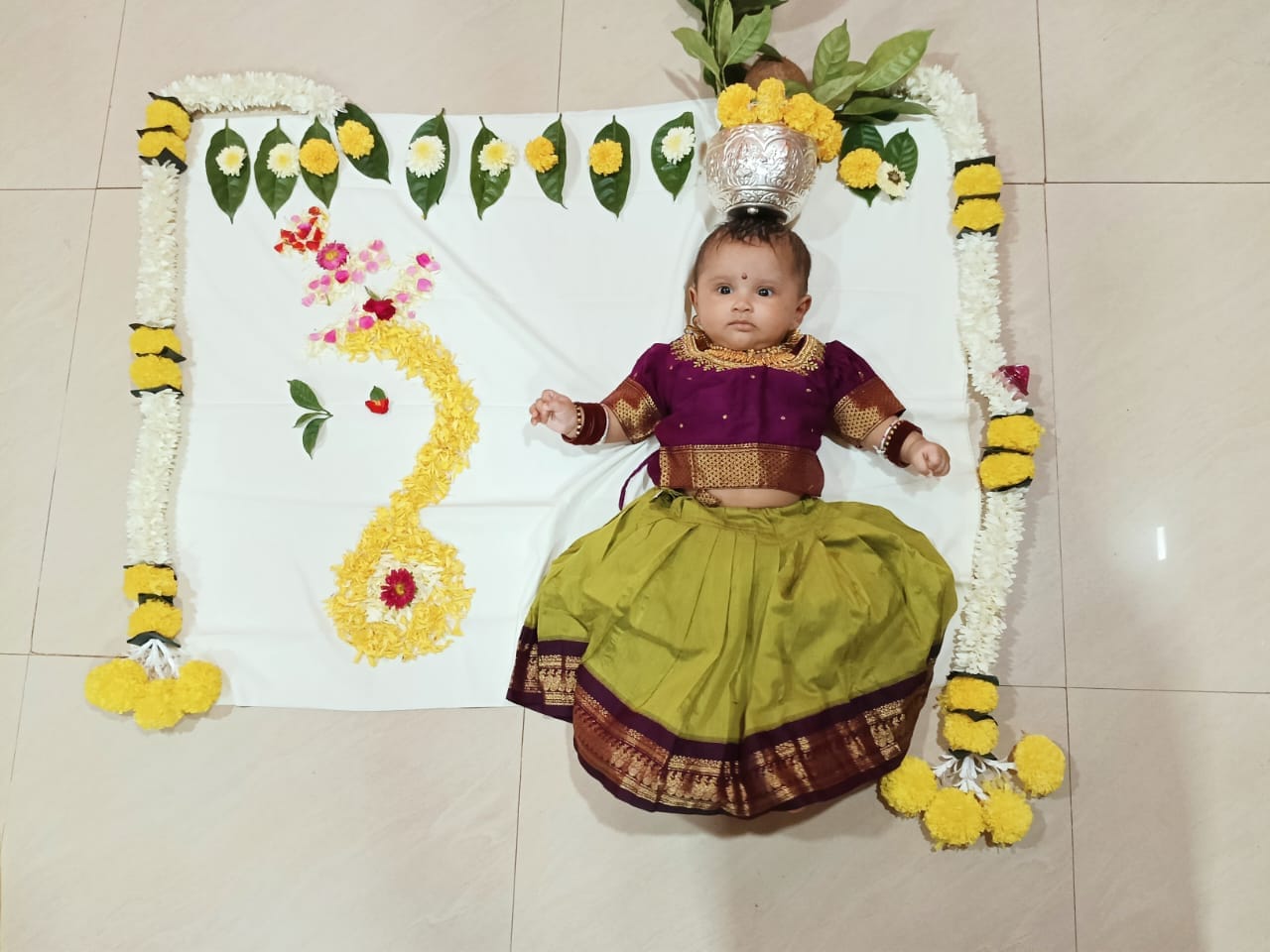 Customer photo review of Green and wine traditional langa blouse embroidered zari border dress for baby girl (100% Pure Cotton)