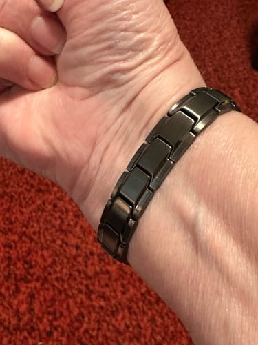 Customer photo review of Body Armor Titanium Magnetic Bracelet: Helps Pair Veterans With A Service Dog Or Shelter Dog