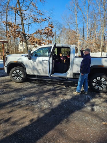 Customer photo review of NEW Waterproof Hard Bottom Car & Truck Seat Foldable Hammock Cover With Storage Pockets, Side Flaps, Headrest Straps, Seat Anchors, & Mesh Window (+FREE SAFETY BELT!)