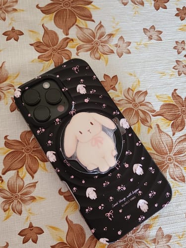 Customer photo review of Cute Puppy And Bow Designer Silicon Ripple Case With Holder for iPhone