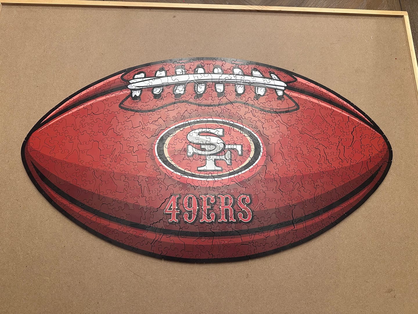 Customer photo review of San Francisco 49ers™ Football - Wooden Puzzle