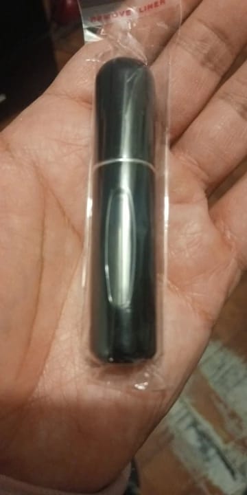 Customer photo review of Aluminum Portable Refillable Perfume Bottle With Atomizer Spray 5ml Capacity — Pink | KIMLUD