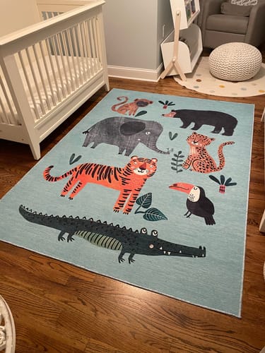 Customer photo review of Petey Blue Animal Print Washable Kids Rug