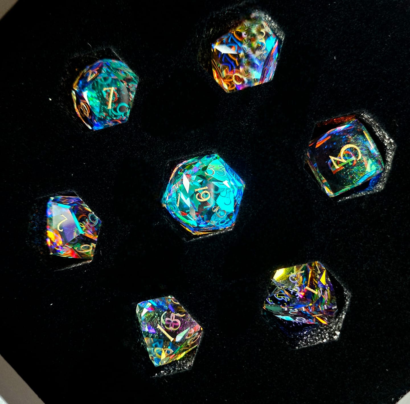 Customer photo review of URWizards D&D Multi-faceted Prism Glass Engraved Dice Set