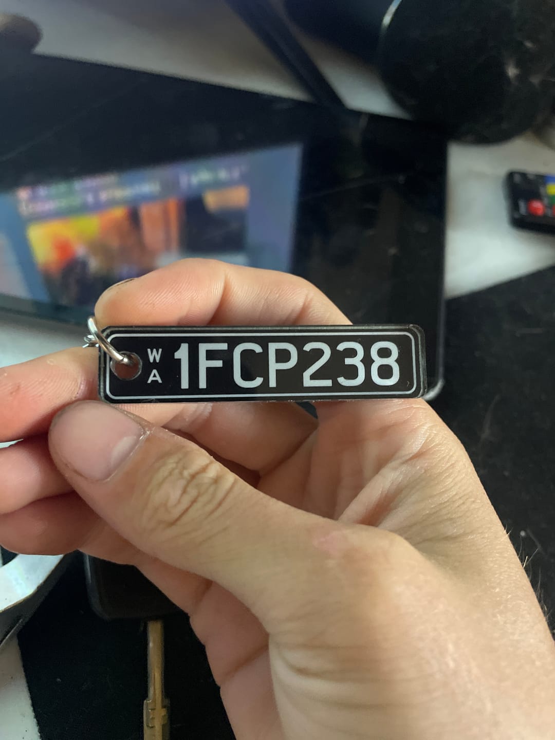 Customer photo review of WA Prestige Licence Plate Custom Keychain