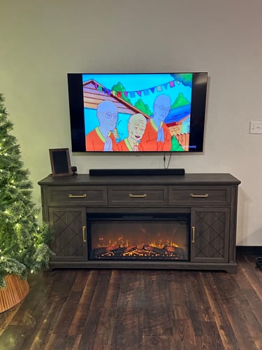 Customer photo review of 68" Grooved Door Farmhouse Fireplace TV Stand