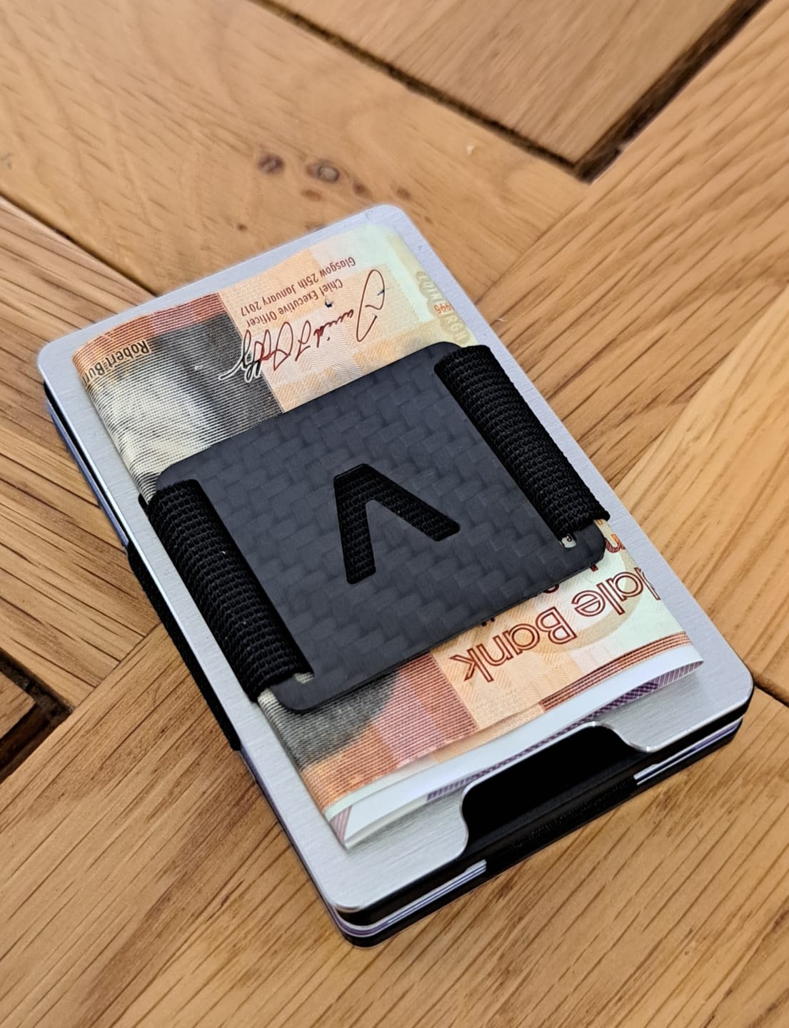 Customer photo review of NOT FLAW[LESS] Brushed Silver Aluminum Slim Wallet