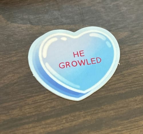 Customer photo review of He Growled Candy Heart Sticker