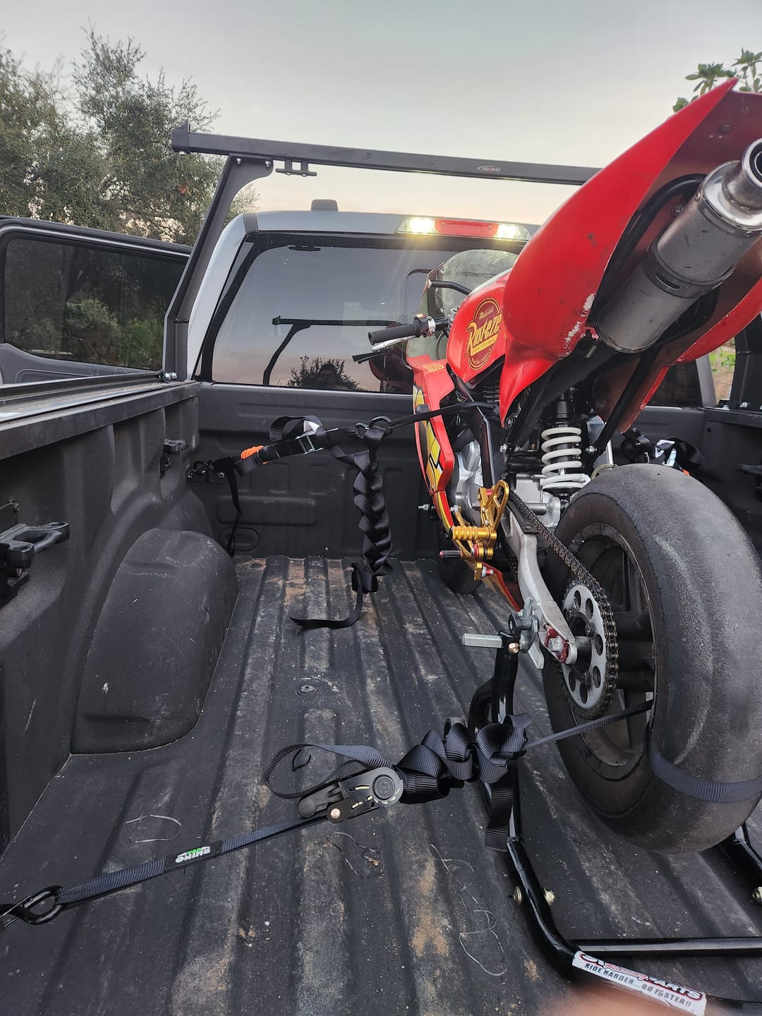 Customer photo review of TorkStrap HD750 | 14'x1.5'' Spring Loaded Tie Down Straps - Adapts to Load Shifts - Heavy Duty 2250lbs Max Load - Just Pull Alternative to Ratchet Straps w/Hooks - Secure Motorcycles, Kayaks