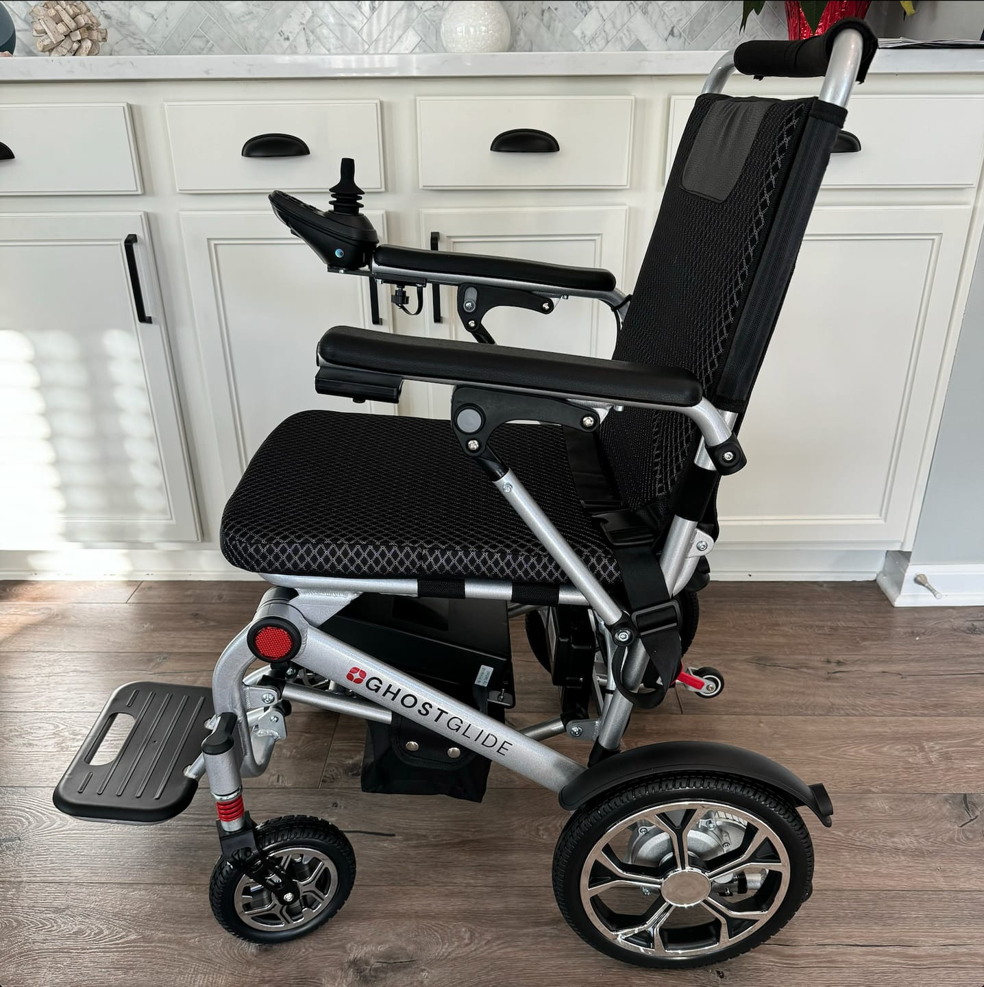 Customer photo review of Premium Featherweight Electric Wheelchair - Ultra Portable & Comfortable Design