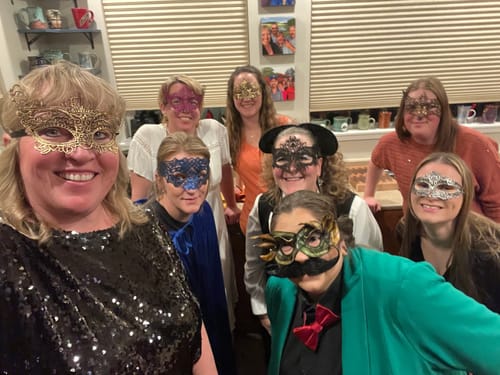 Customer photo review of Masquerade Ball/Carnival Murder Mystery Host Your Own Game Kit