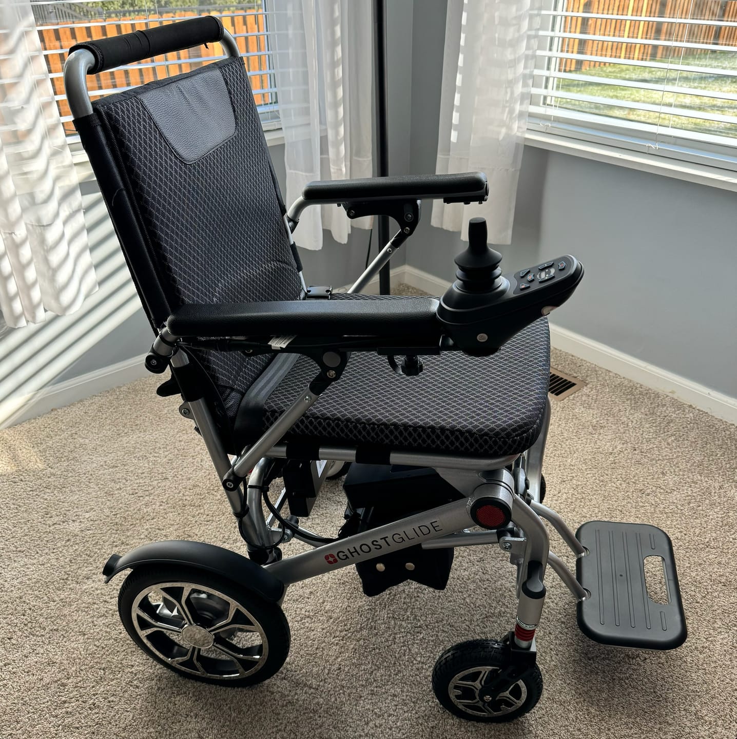 Customer photo review of Premium Featherweight Electric Wheelchair - Ultra Portable & Comfortable Design