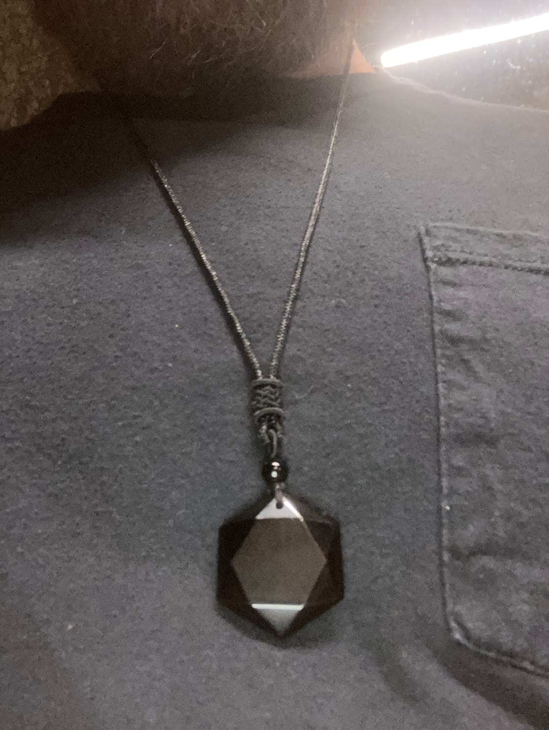Customer photo review of Obsidian Self Protection Necklace