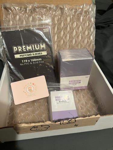 Customer photo review of PREMIUM PHOTOCARD SLEEVES - PURPLE VERSION (57x88MM)