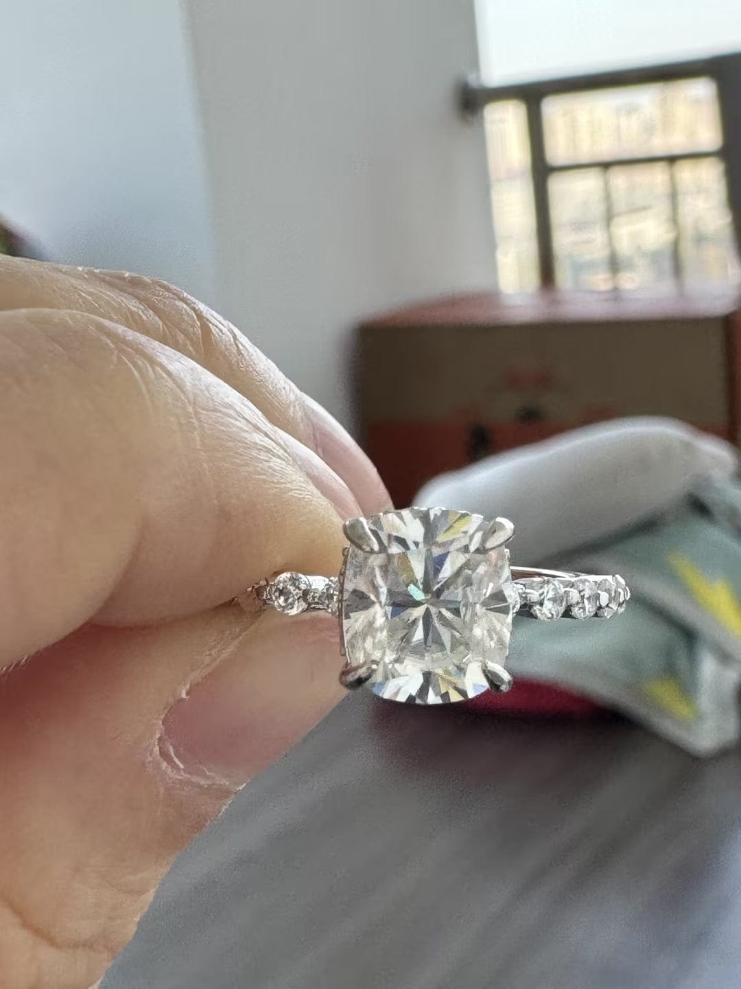 Customer photo review of Rodiffy Moissanite 2.0 Ct White Gold Cushion Cut Bridal Ring