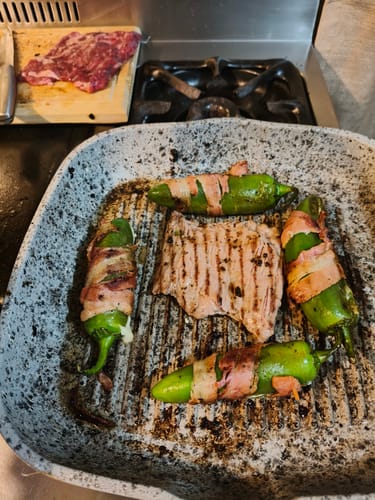 Reseña con foto de un cliente sobre Rib Eye Steak