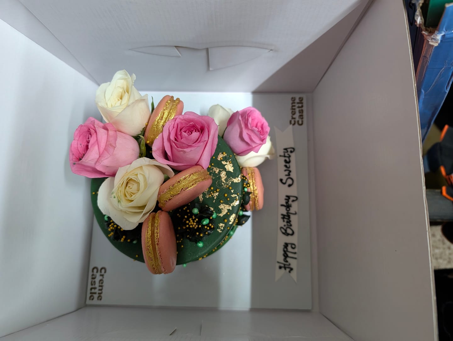 Customer photo review of Bottle Green Floral Cake