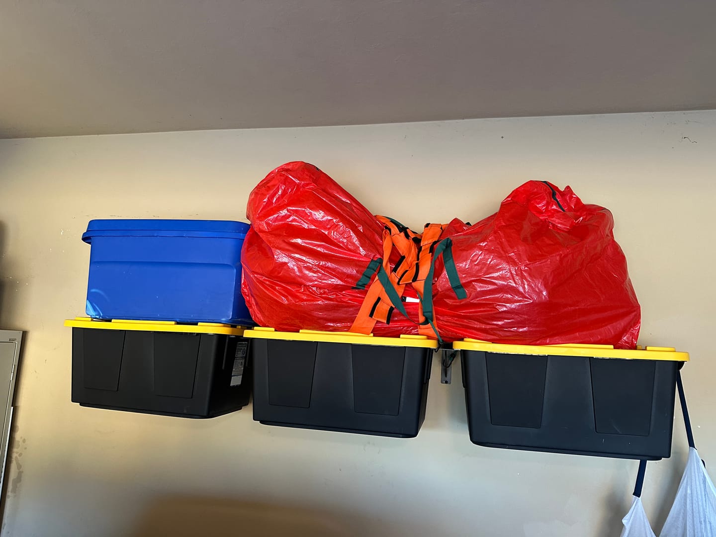 Customer photo review of Wall Bin Storage System for Garage or Shed Organization