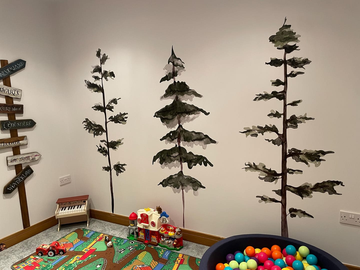 Customer photo review of Large Watercolor Pine Tree Removable Wall Decal