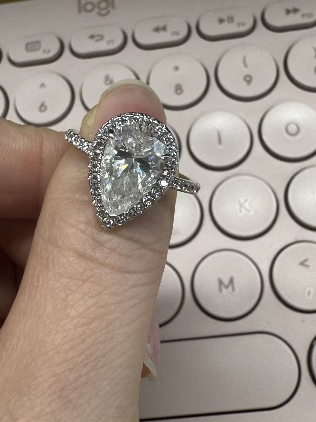 Customer photo review of Rodiffy Moissanite 2.5 Ct Pear Cut Halo Engagement Ring For Women