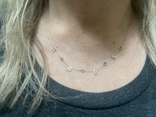 Customer photo review of 14K Solid Gold Birthstone Letter Necklace